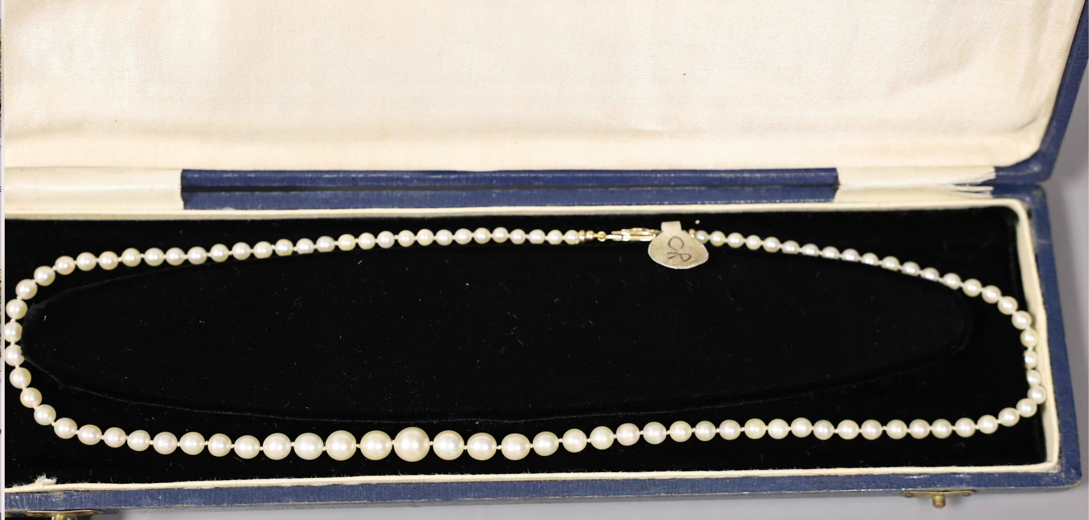 Four assorted cased single strand cultured pearl necklaces, with yellow metal or sterling clasps, longest 48cm.